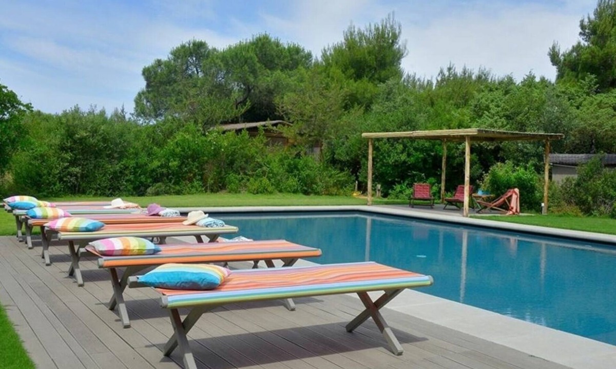 Etruscan Coast Villa | Beach Front Bibbona, an elegant 600 sqm villa with swimming pool surrounded by a beautiful garde.