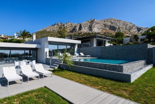 Palaia Fokaia Villa | Black Diamond Luxury Beachfront Villa Selenia
