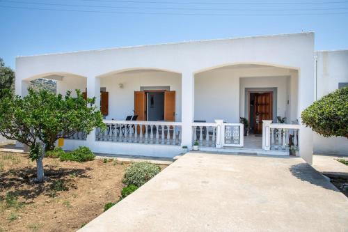 Gourna House | Debbie's Holiday Home with sunset