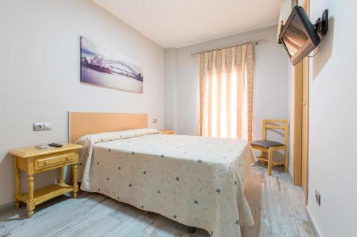 El Puig de Santa Maria House | Olympia Ronda Hostel