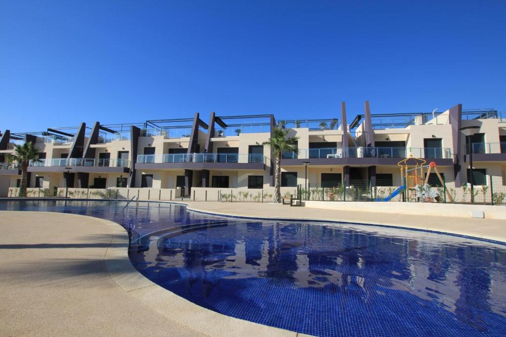 Pueblo Latino Apartment | Playa Elisa Costa 819 - Pool view 400m from Mil Palmeras beach