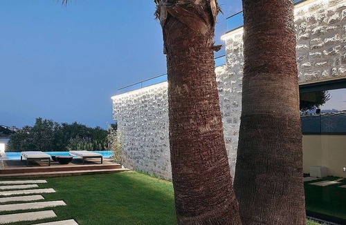 Almyros Villa | Beachfront 2 bedroom villa with a heated pool