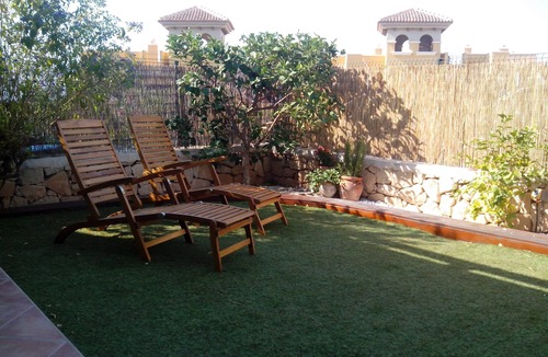 Isla Plana Apartment | Charming and spacious ground floor apartment with own gardens and shared pool