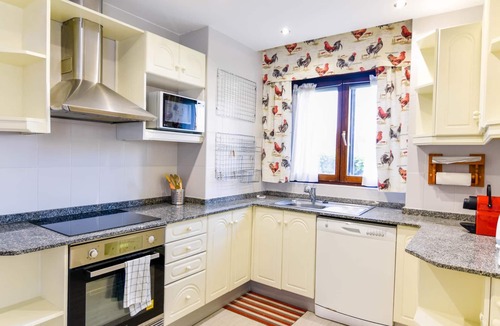 Miengo Villa | Comfortable and spacious villa with communal swimming pool
