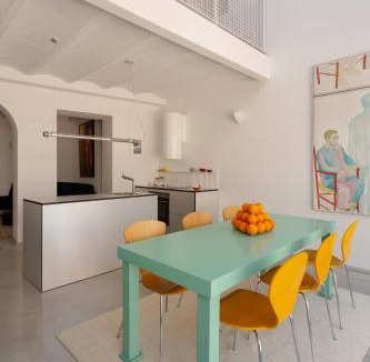Carrion De Los Cespedes Apartment | Design & art, patio with orange tree, near Seville