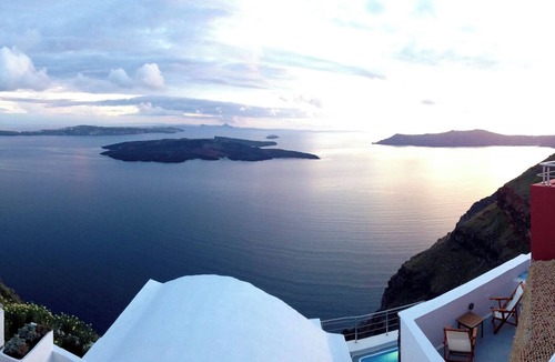 Imerovigli Villa | Hara's Houses, a unique cliffside villa with 5 private studios sharing a pool.