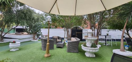 Palomas House | Hostal Escala Suites