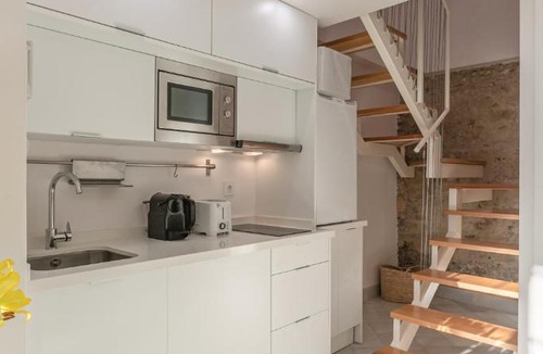 Museo Apartment | Loft duplex Sevilla wall