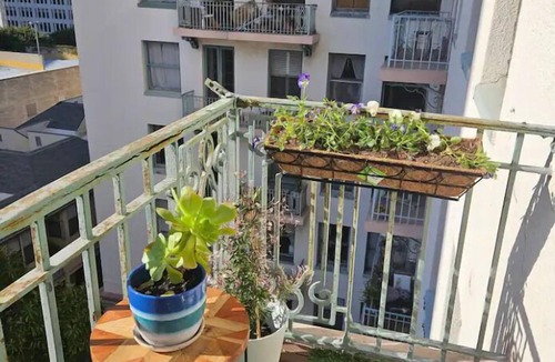 East Village Condo | Luxe Suite one bedroom condo with free parking, balcony and partial ocean view.