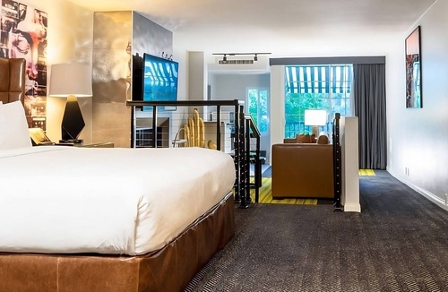 Norma Triangle Hotel | Modern 2 Units w/City Views, Rooftop Pool & Pet-Friendly Escape