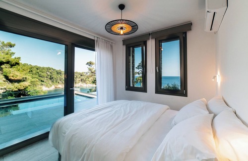 Votsi Villa | Ocean-front villa, private pool in Alonissos island, Greece. Panoramic sea view.