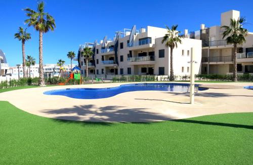 Pueblo Latino Apartment | Playa Elisa Bay - Mil Palmeras