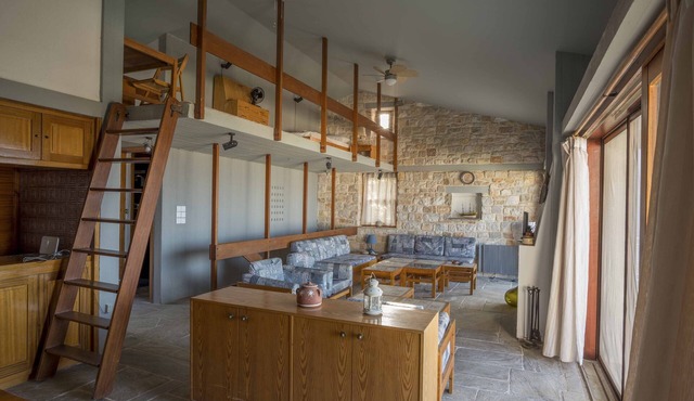 An architect's masonry house,Anavyssos, Attica, with view to Aghios Nikolaos be
