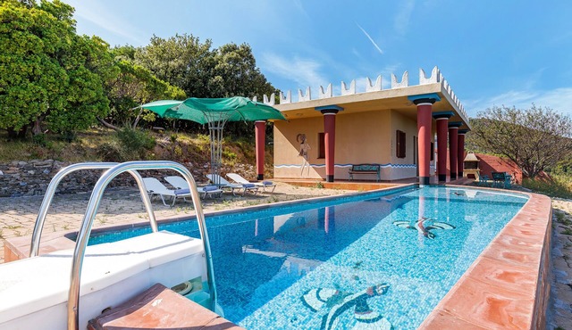Character villa within countryside setting with private pool and sea view.