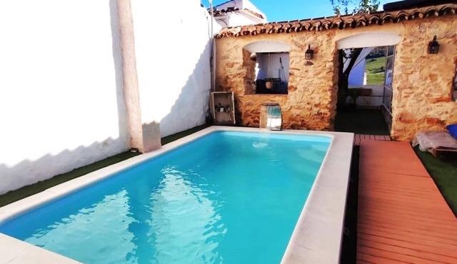 Charming 4-Bedroom House with Shared Pool in Benarrabá, Spain