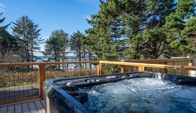 Enjoy sunsets from the hot tub after surfing & beachcombing at Otter Rock Oasis!
