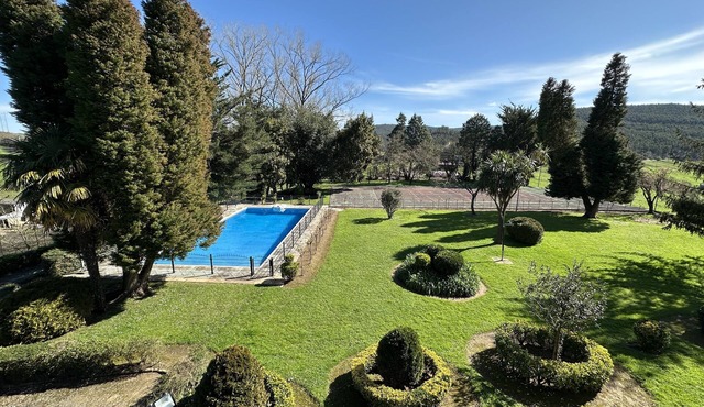 Explore Finca Espinal a retreat with pool and lush gardens.