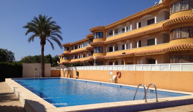 Ground floor apartment with 20m shared, key-only-access pool directly in front.