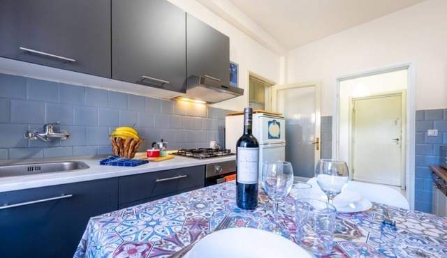 GuestHost - A comfortable and welcoming 83 square meters apartment, perfect for six people, located on the second floor of a 1960s building with an elevator (NOT accessible to disabled guests).The property enjoys an ideal location within the city of Parm