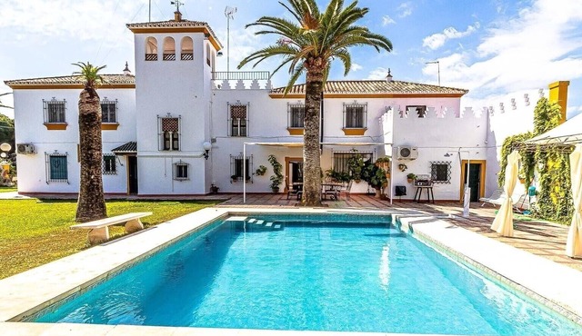 Holiday Home "Hacienda El Corchuelo en Marchena" with Pool, Garden & Wi-Fi