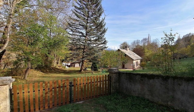 House with large plot and mountain views