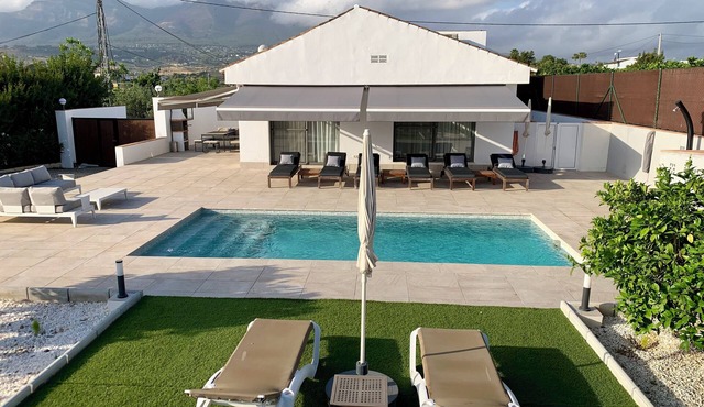 Modern luxury villa w/stunning views, private heated pool + roof terrace
