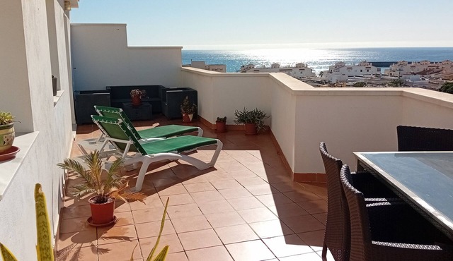 Penthouse next to the Romanilla Beach, dream terrace