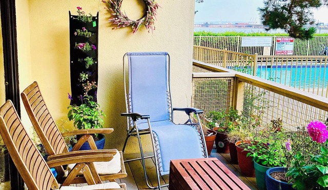 Pet-friendly 2 bdrm condo with waterviews, near shops & transp., w/pool & gym