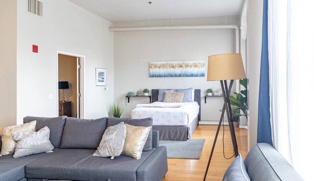Spacious 1 BR 700 sq ft loft suite with free parking, steps to the Convention Center and Gaslamp dining. Ideal for business or group travel.