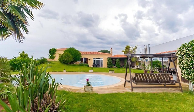 Spacious Luxury 4-Bedroom Villa with Private Pool and Garden