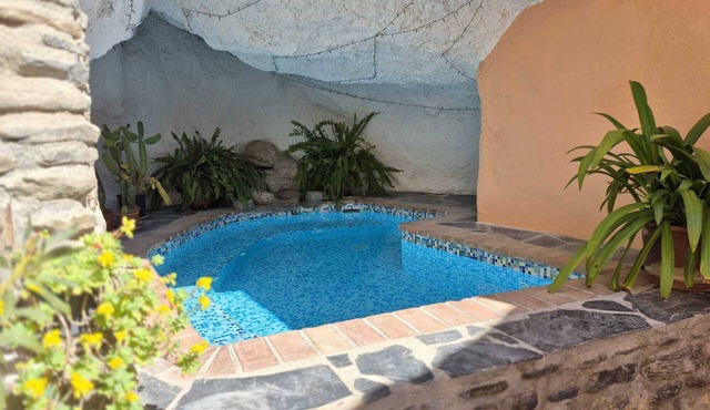 Truly unique and authentic family-town house with cave pool and amazing views.